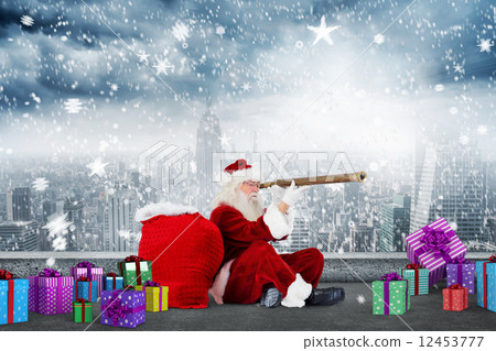 Composite image of santa looking through a telescope 12453777