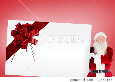 Santa claus showing card with ribbon 12454167