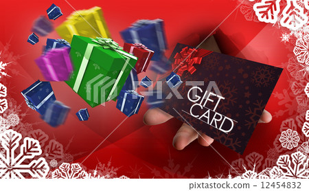 Composite image of hand bursting through paper 12454832