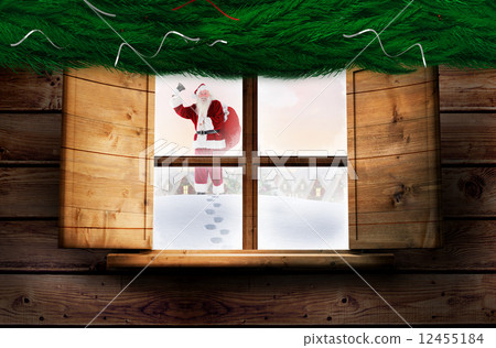 Composite image of santa delivery presents to village 12455184