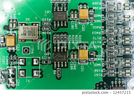 Printed Circuit board from a computer in black with green lines 12457215