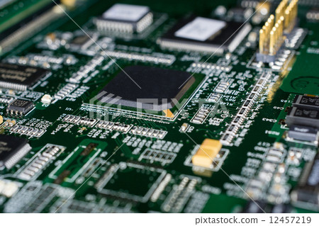 Printed Circuit board from a computer in black with green lines Printed Circuit board from a computer in black with green lines 12457219