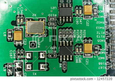 Printed Circuit board from a computer in black with green lines Printed Circuit board from a computer in black with green lines 12457220