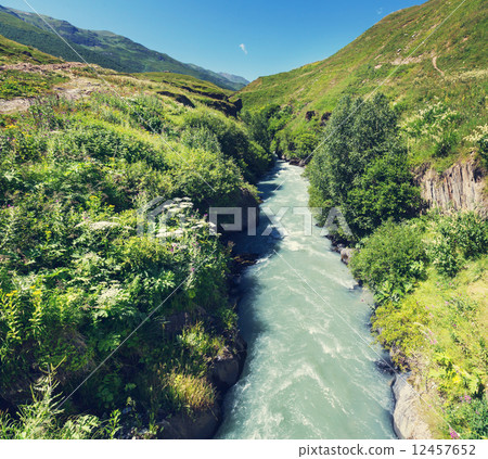 River in mountains 12457652