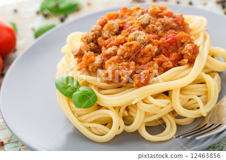 Stock Photo: Spaghetti bolognese with basil leave