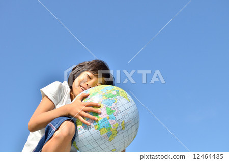 A girl holding the earth 12464485