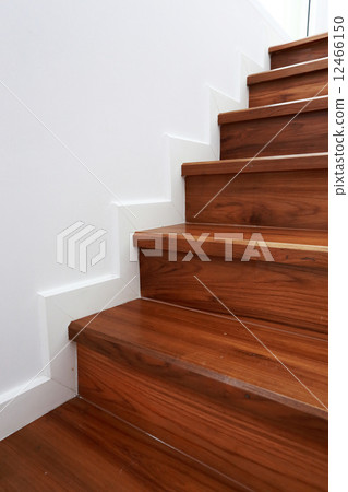 wooden staircase in a white modern house wooden staircase in a white modern house 12466150