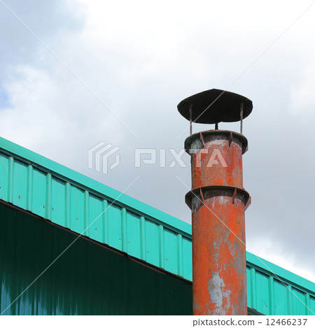 smokestack pollution with blue sky background 12466237