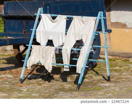 Vintage clothes on drying rack Vintage clothes on drying rack 12467224