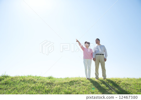 Blue sky and mature couple Blue sky and mature couple 12467380