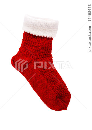 Knitted red Christmas sock Isolated on white. 12468458