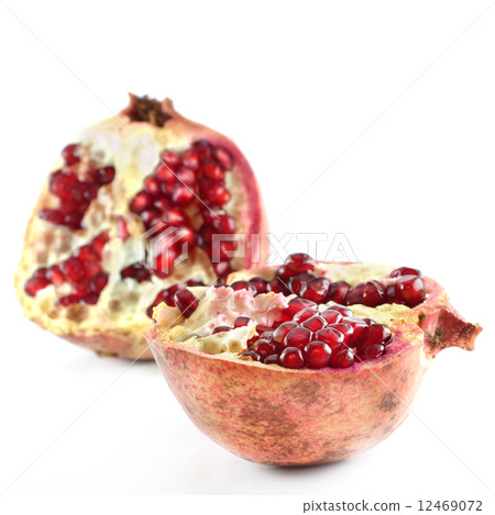 Pomegranate on a white 12469072