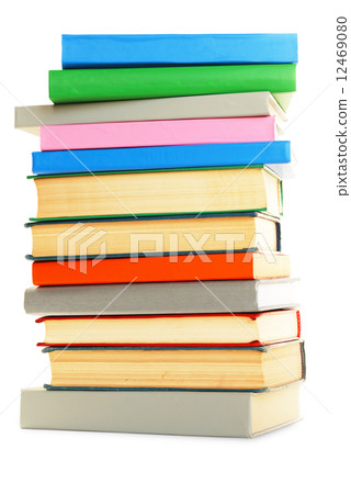 Stack of books over white. 12469080