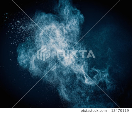 Blue powder exploding isolated on black Blue powder exploding isolated on black 12470119