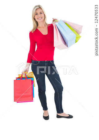 Happy blonde holding shopping bags Happy blonde holding shopping bags 12470533