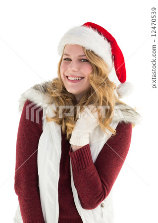 Blonde in santa hat smiling at camera 12470539