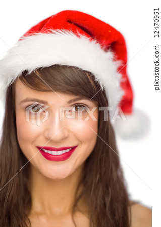 Close up portrait of pretty woman in santa hat smiling Close up portrait of pretty woman in santa hat smiling 12470951