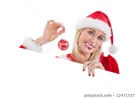 Festive blonde showing white card Festive blonde showing white card 12471557
