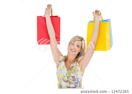 Happy blonde with shopping bags 12472265