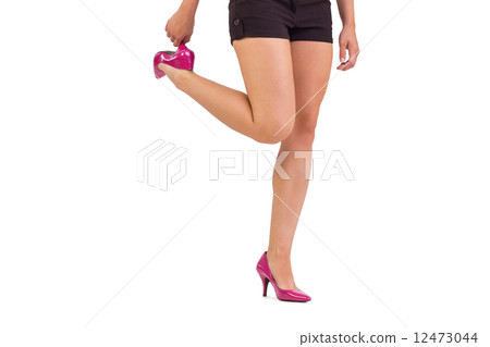 Womans legs in high heels Womans legs in high heels 12473044