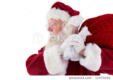 Santa carries his red bag Santa carries his red bag 12473050