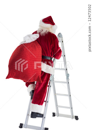 Santa steps up a ladder Santa steps up a ladder 12473502