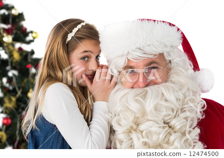 Little girl teling santa claus a secret 12474500