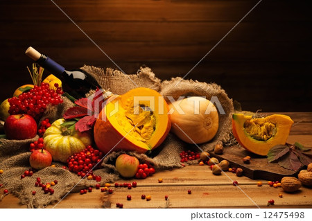 Thanksgiving day autumnal still life with bottle of wine Thanksgiving day autumnal still life with bottle of wine 12475498