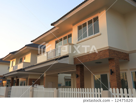 Big house modern style with sunshine and blue sky background Big house modern style with sunshine and blue sky background 12475820