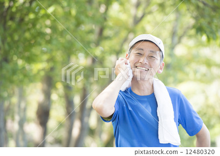 Men in their 50s jogging 12480320