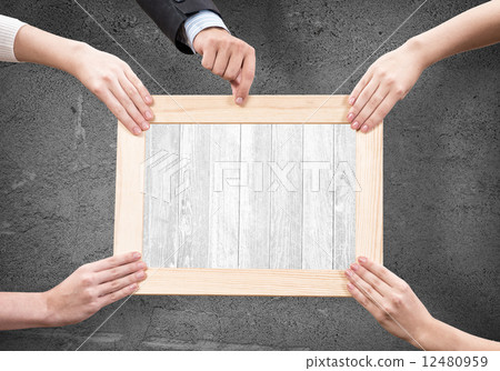 Hands holding frame Hands holding frame 12480959