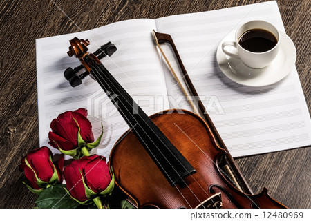 Violin, rose, coffee and music books Violin, rose, coffee and music books 12480969