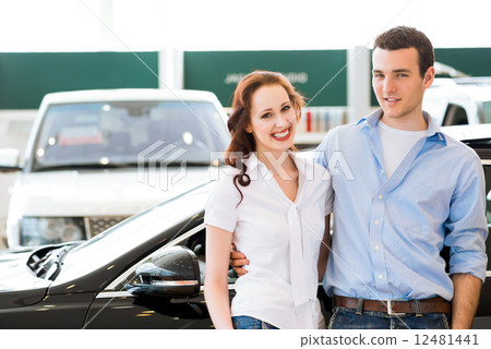 Young couple in the showroom Young couple in the showroom 12481441