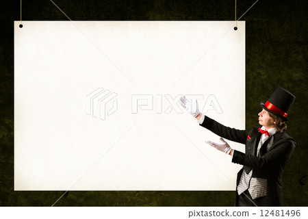 magician in top hat and tie points to the banner magician in top hat and tie points to the banner 12481496