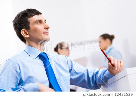 Portrait of a businessman in a blue shirt Portrait of a businessman in a blue shirt 12481529