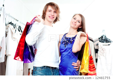 Shopping smile couple at the mall Shopping smile couple at the mall 12481755