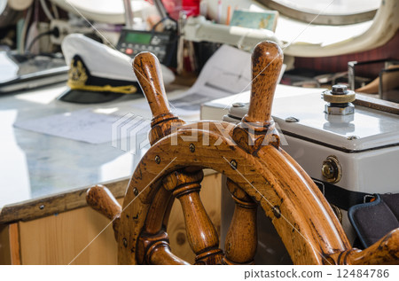Steering wheel of the ship. A workplace of the captain 12484786