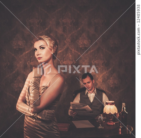 Couple in retro home  interior 12485938