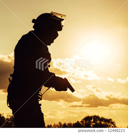 police officer with pistol police officer with pistol 12490223