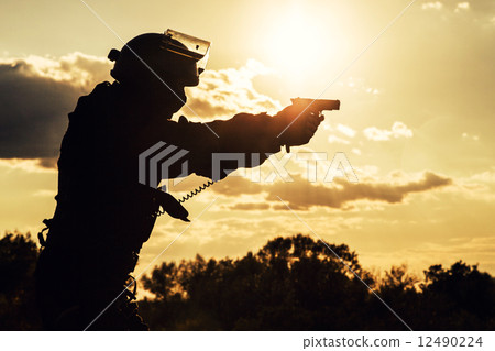 police officer with pistol police officer with pistol 12490224