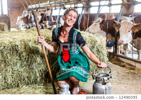 Sexy Countrywoman in cowhouse Sexy Countrywoman in cowhouse 12490395