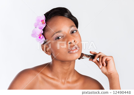 Beautiful African woman in Studio with makeup Beautiful African woman in Studio with makeup 12490448