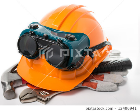 Safety hat and goggles glasses isolated 12496941