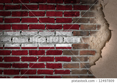 Dark brick wall with plaster - Latvia 12497809