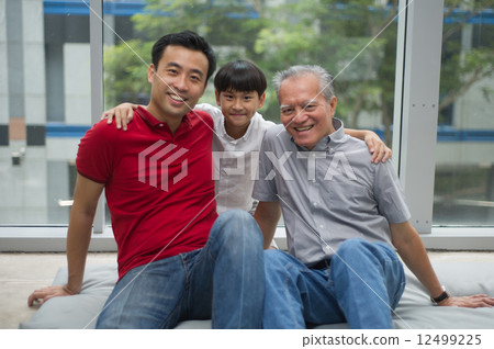 three generation asian men enjoying family bonding time together 12499225