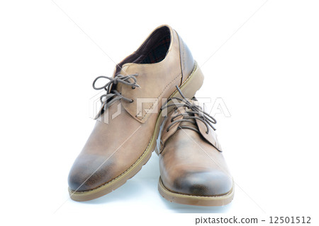 Leather brown shoes isolated on white background 12501512