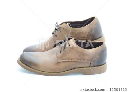Leather brown shoes isolated on white background 12501513