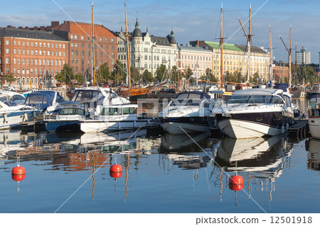 Yachts and motor boats moored in Helsinki, Finland Yachts and motor boats moored in Helsinki, Finland 12501918