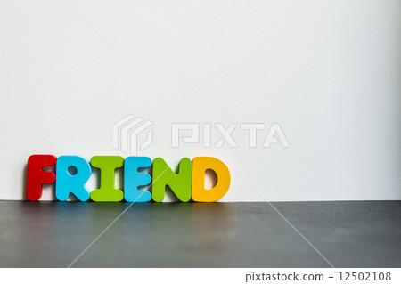 Colorful wooden word Friend with white background Colorful wooden word Friend with white background 12502108