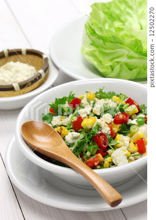 Tofu and vegetables lettuce wrapping 12502270